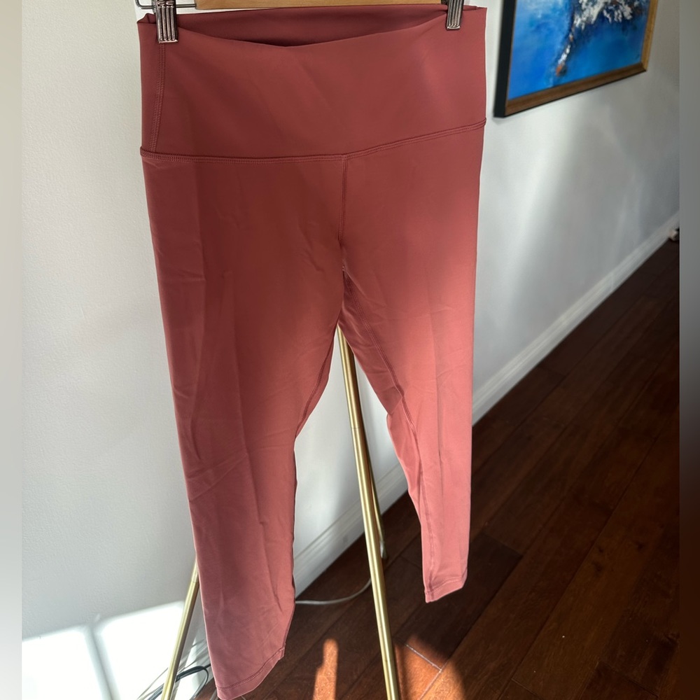 Lululemon legging, barely wear, with wash tag on, size 10, rose pink color.